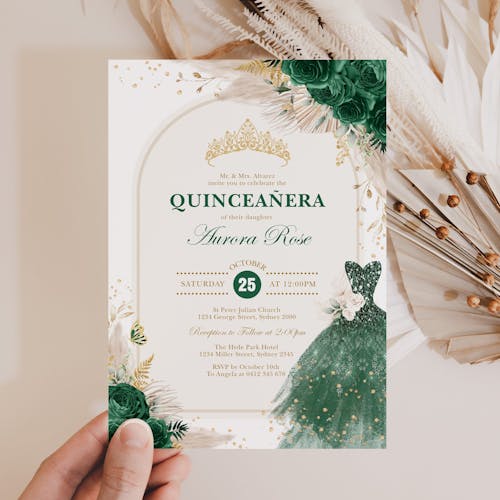 enchanted forest themed quinceanera invitation held in one hand